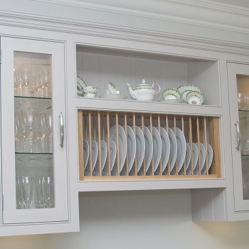 wall unit with glazed doors and plate rack