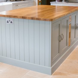 large kitchen island with oak worktop